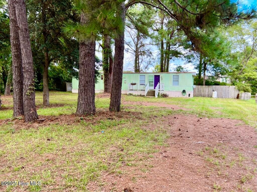Photo of 113 Old Farm Road, Hampstead, NC 28443 (MLS # 100527564)