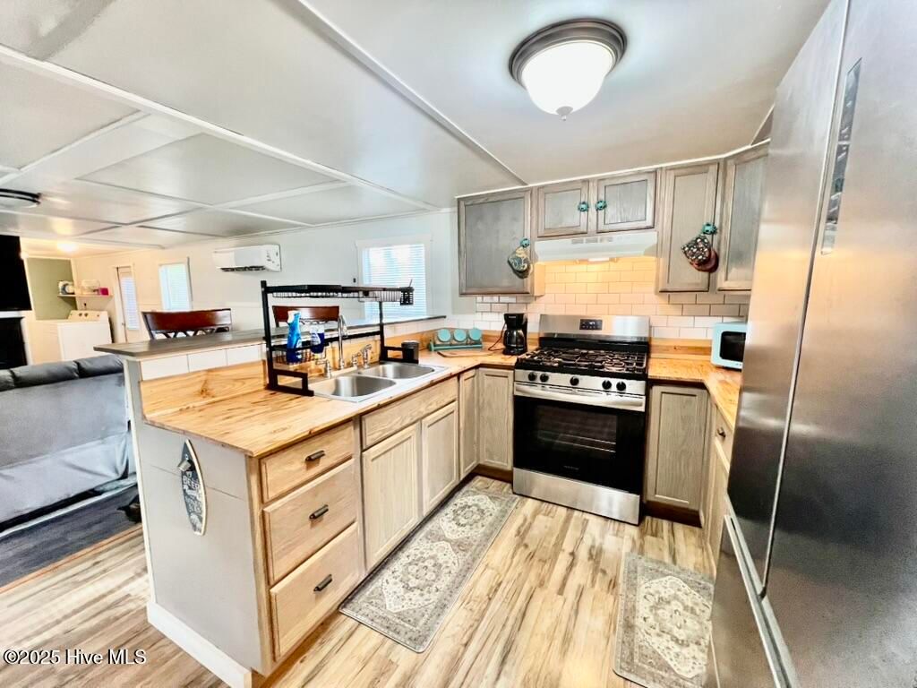 Photo of 113 Old Farm Road, Hampstead, NC 28443 (MLS # 100527564)