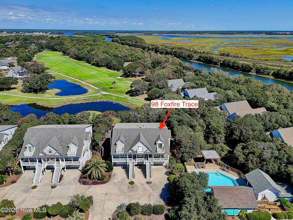Photo of 98 Foxfire Trace, Caswell Beach, NC 28465 (MLS # 100533940)
