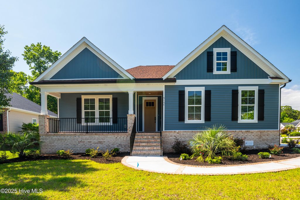 Photo of 1212 Moultrie Drive NW, Calabash, NC 28467 (MLS # 100541947)