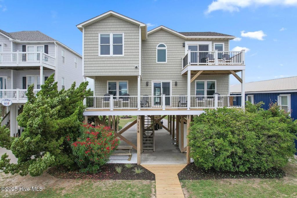 Photo of 1116 E Beach Drive, Oak Island, NC 28465 (MLS # 100509585)