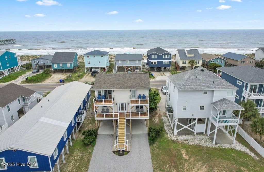 Photo of 1116 E Beach Drive, Oak Island, NC 28465 (MLS # 100509585)