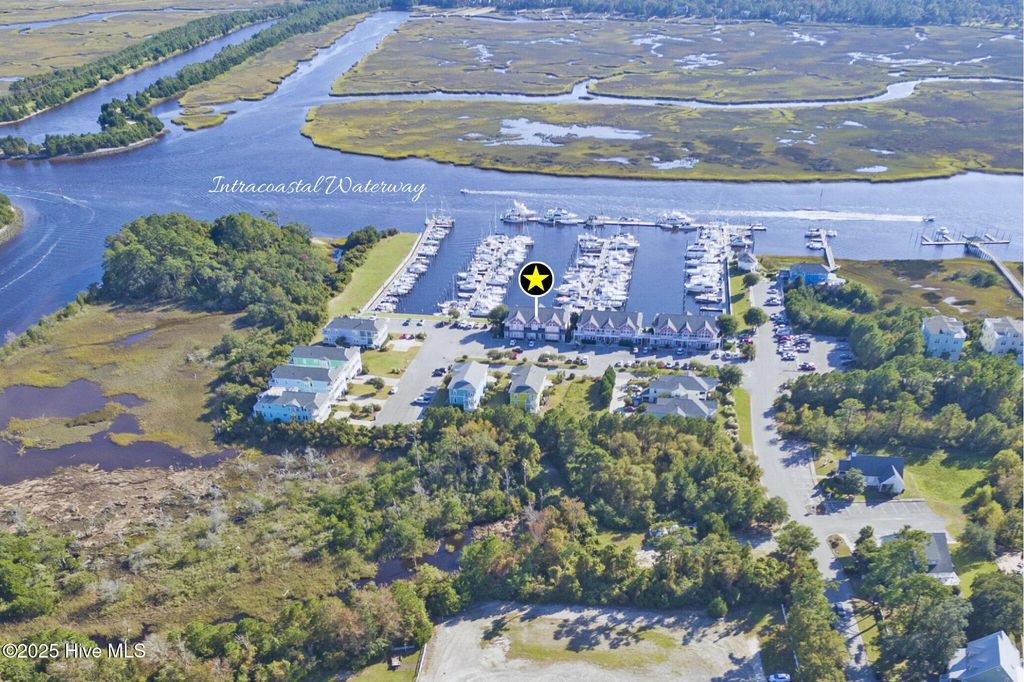 Photo of 5005 Oquinn Boulevard SE #104, Southport, NC 28461 (MLS # 100535611)