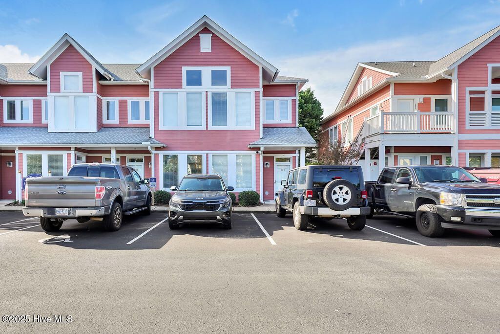 Photo of 5005 Oquinn Boulevard SE #104, Southport, NC 28461 (MLS # 100535611)