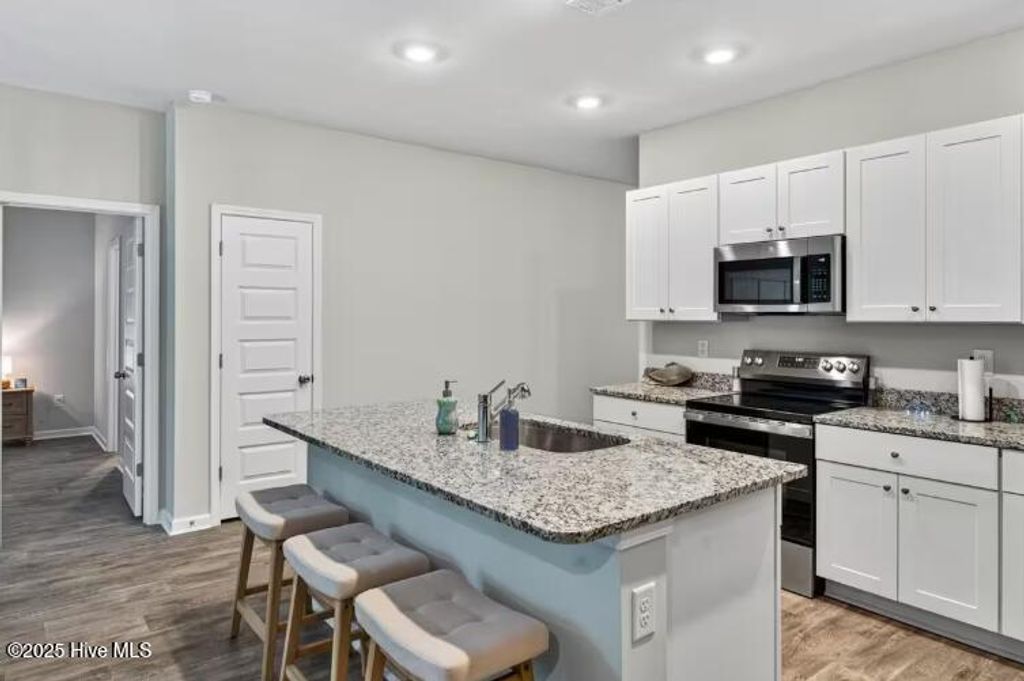 Photo of 394 Ladyfish Loop NW, Sunset Beach, NC 28468 (MLS # 100543236)