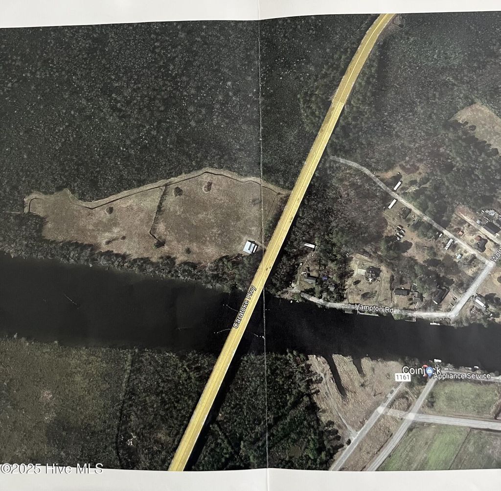 Photo of 150 Hampton Road, Coinjock, NC 27923 (MLS # 100509520)