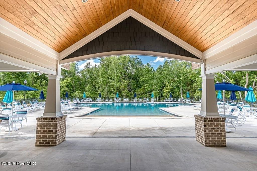 Photo of 511 Heartwood Drive, Winnabow, NC 28479 (MLS # 100529900)