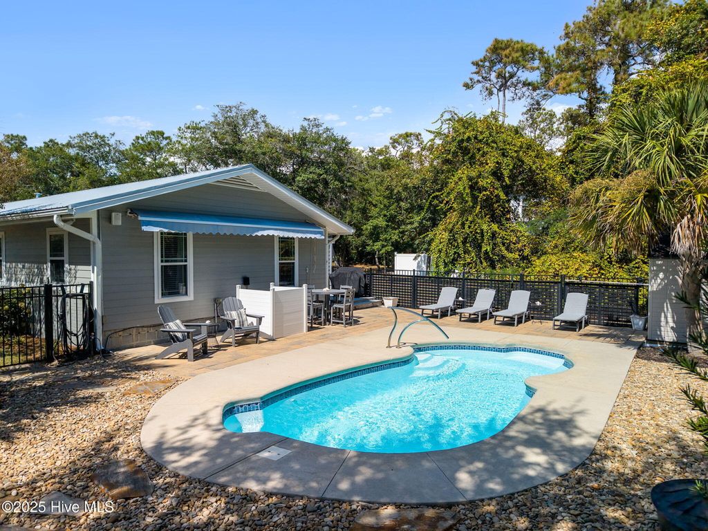 Photo of 202 NE 40th Street, Oak Island, NC 28465 (MLS # 100533111)