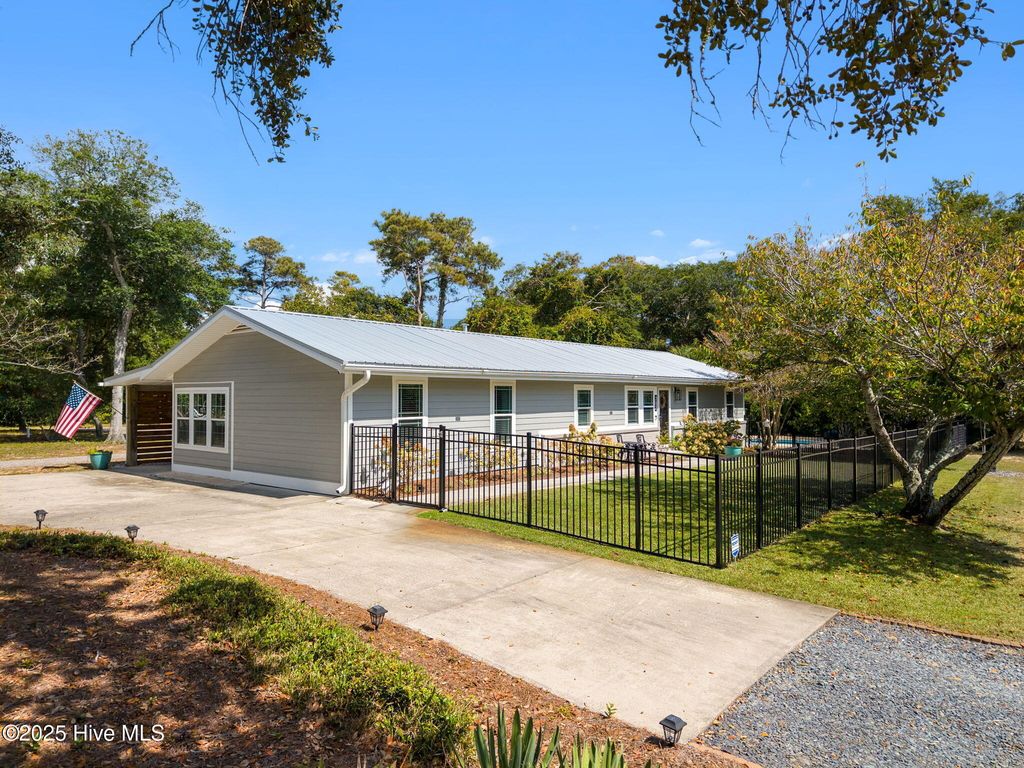 Photo of 202 NE 40th Street, Oak Island, NC 28465 (MLS # 100533111)