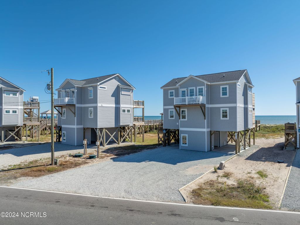 Photo of 1016 New River Inlet Road, North Topsail Beach, NC 28460 (MLS # 100529941)