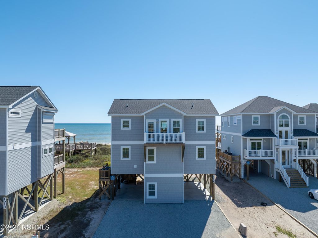 Photo of 1016 New River Inlet Road, North Topsail Beach, NC 28460 (MLS # 100529941)
