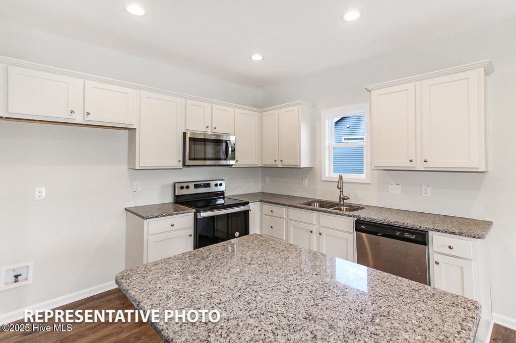 Photo of 102 Tigris Court, Zebulon, NC 27597 (MLS # 100537740)