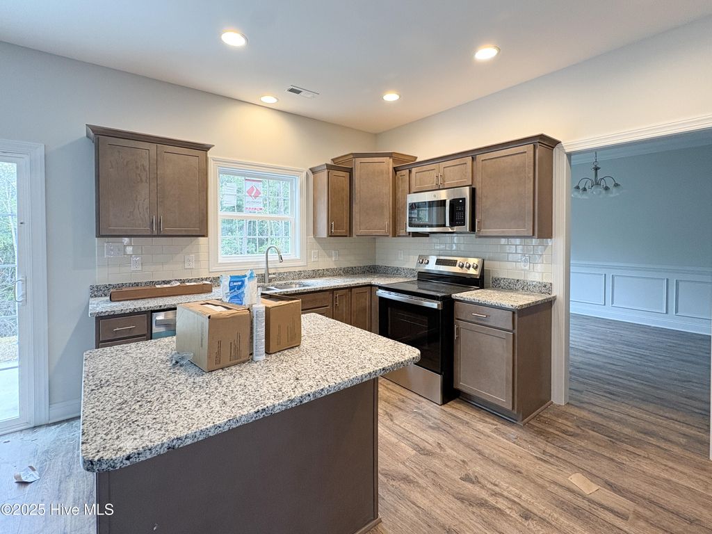 Photo of 716 Ellabond Street, Sneads Ferry, NC 28460 (MLS # 100499950)