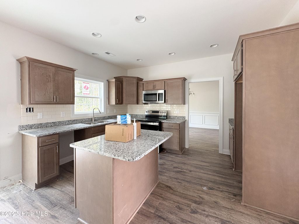 Photo of 716 Ellabond Street, Sneads Ferry, NC 28460 (MLS # 100499950)