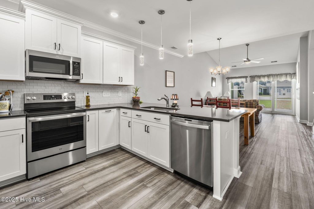 Photo of 8840 Radcliff Drive NW, Calabash, NC 28467 (MLS # 100514884)