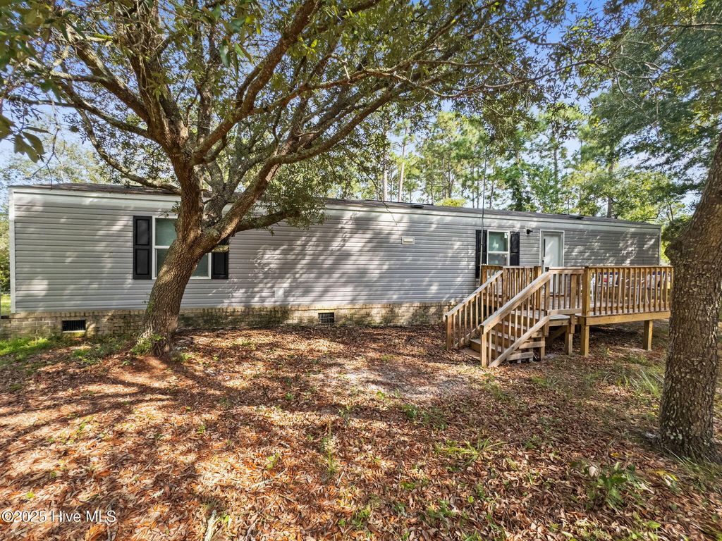 Photo of 293 Sycamore Road, Southport, NC 28461 (MLS # 100525227)