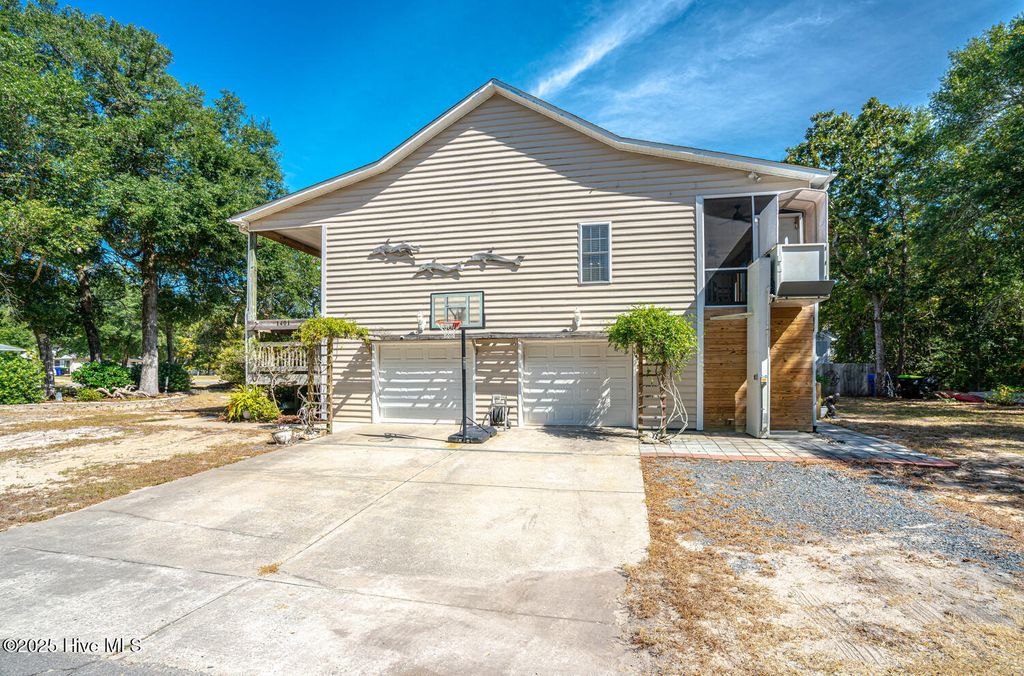 Photo of 1401 E Oak Island Drive, Oak Island, NC 28465 (MLS # 100532611)