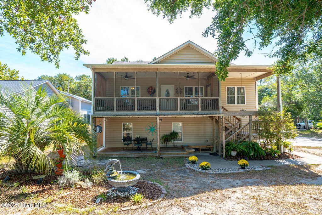 Photo of 1401 E Oak Island Drive, Oak Island, NC 28465 (MLS # 100532611)
