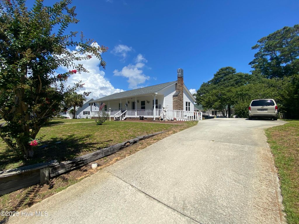 Photo of 310 NE 58th Street, Oak Island, NC 28465 (MLS # 100521634)