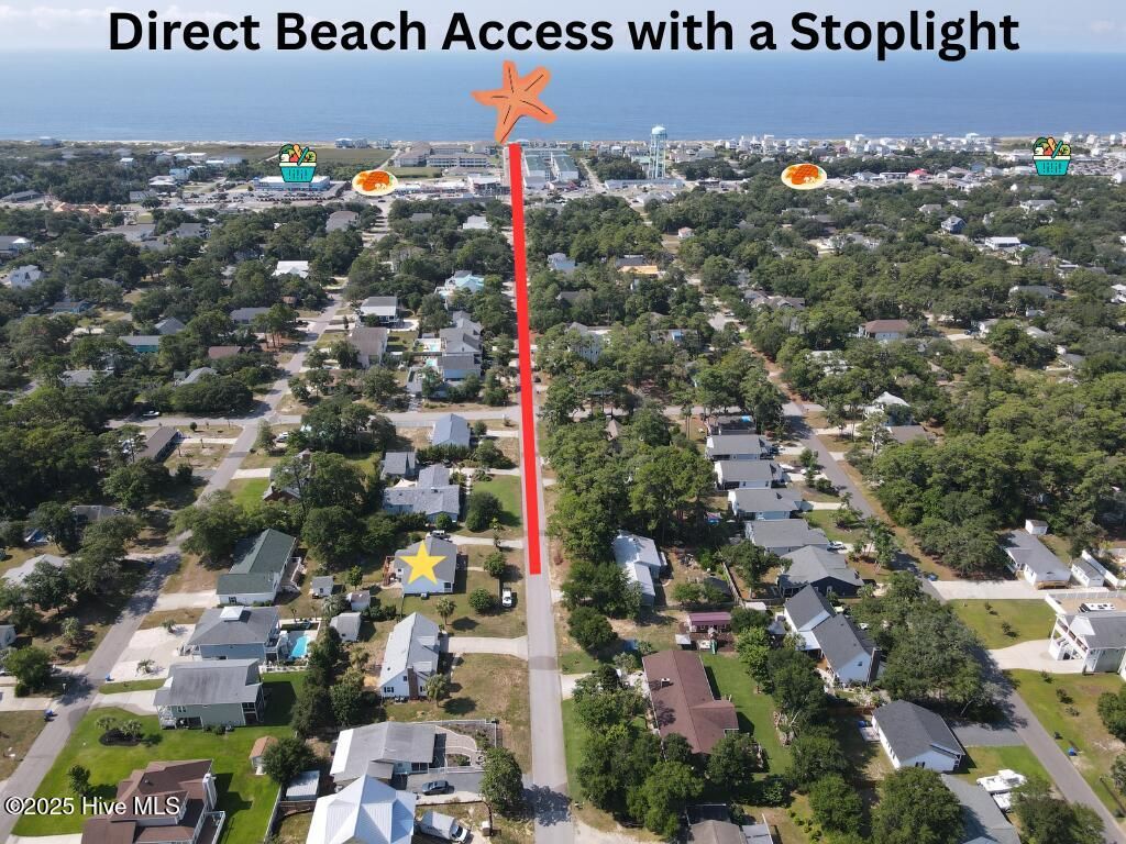 Photo of 310 NE 58th Street, Oak Island, NC 28465 (MLS # 100521634)