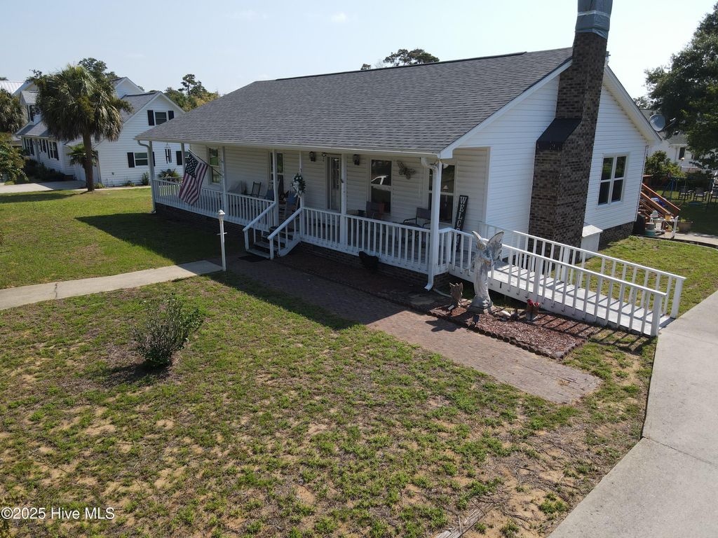 Photo of 310 NE 58th Street, Oak Island, NC 28465 (MLS # 100521634)