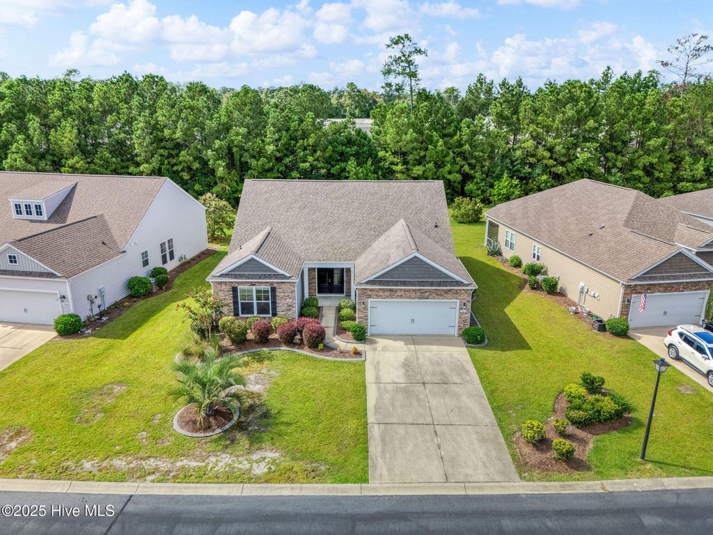 Photo of 3070 Crescent Lake Drive, Carolina Shores, NC 28467 (MLS # 100530263)