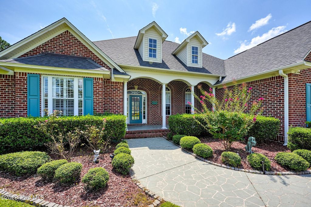 Photo of 1031 W West Cove Loop, Leland, NC 28451 (MLS # 100526154)