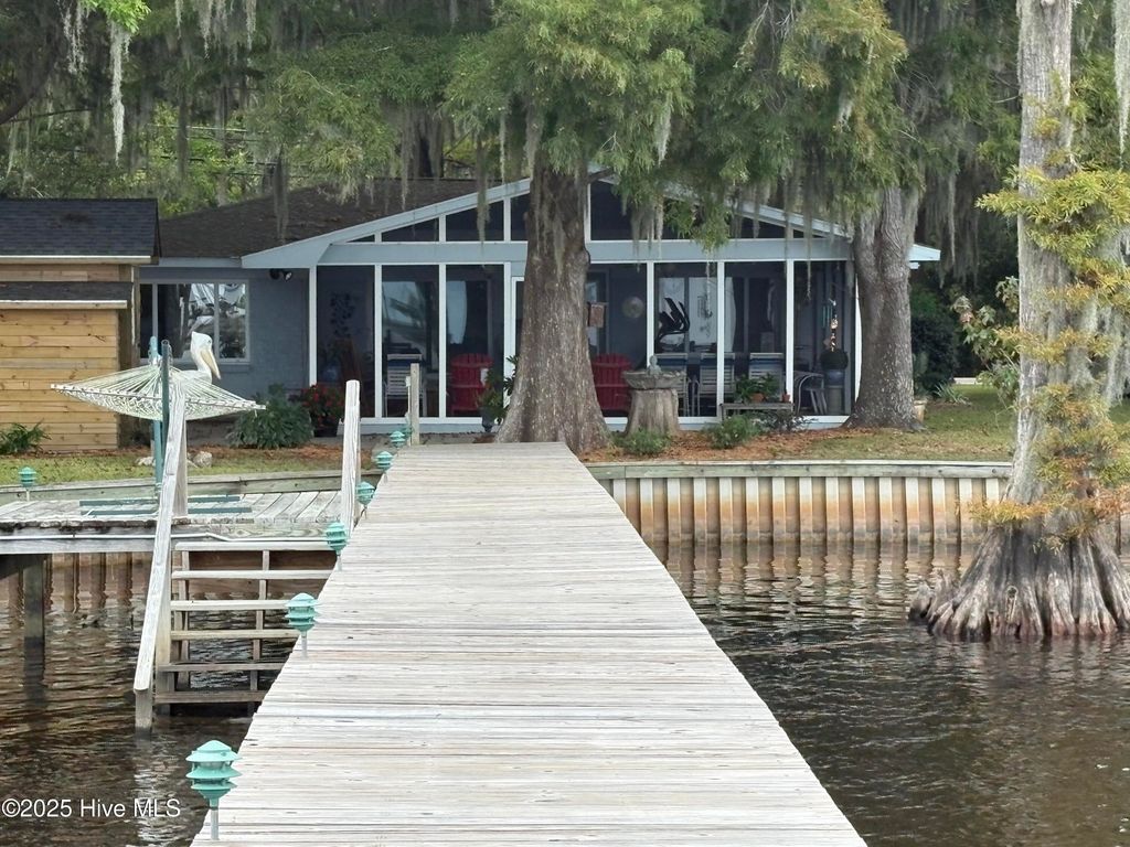 Photo of 802 Canal Cove Road, Lake Waccamaw, NC 28450 (MLS # 100534974)
