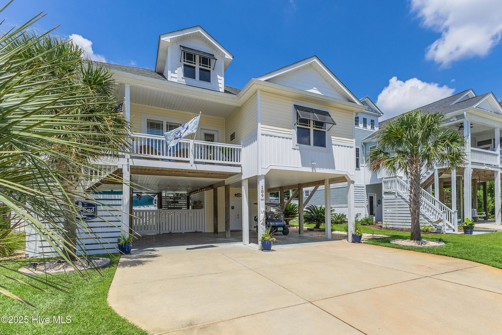 Photo of 109 SE 44th Street, Oak Island, NC 28465 (MLS # 100522499)
