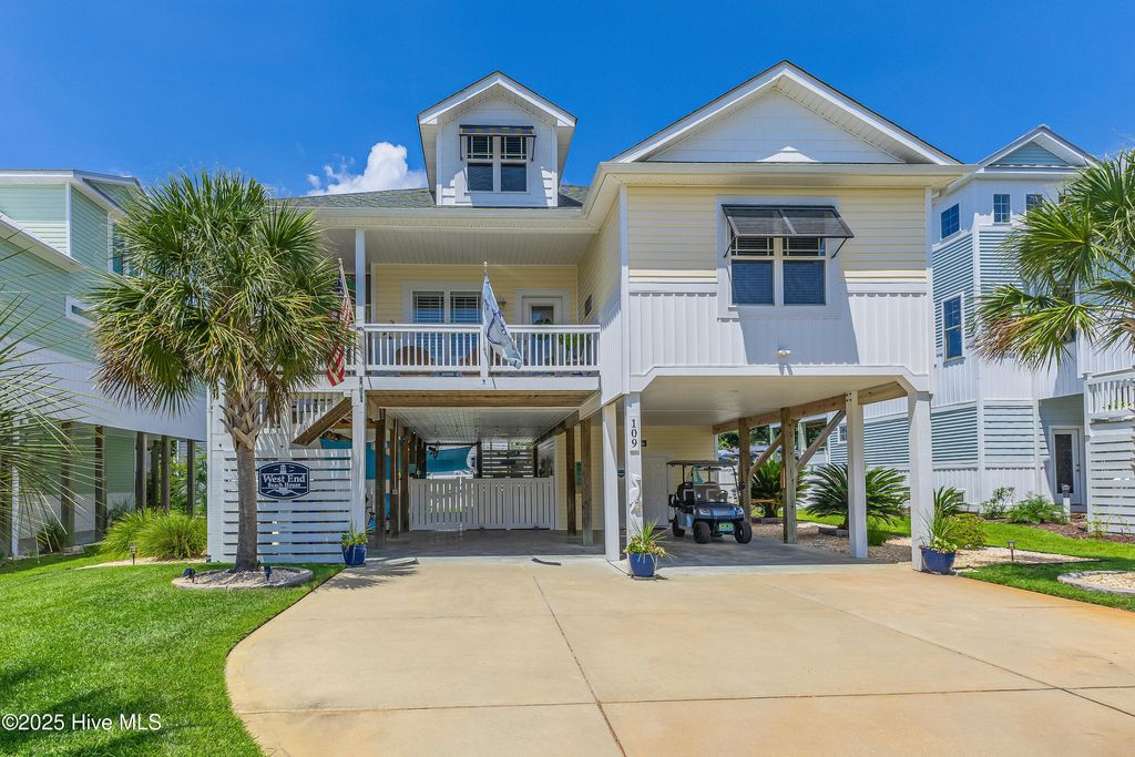Photo of 109 SE 44th Street, Oak Island, NC 28465 (MLS # 100522499)