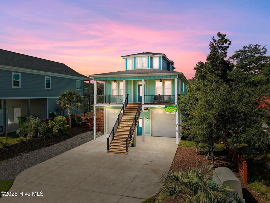 Photo of 604 E Yacht Drive, Oak Island, NC 28465 (MLS # 100527753)