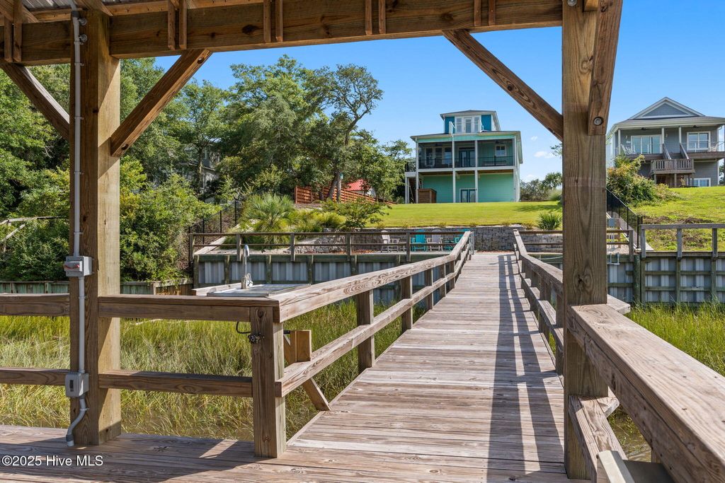 Photo of 604 E Yacht Drive, Oak Island, NC 28465 (MLS # 100527753)