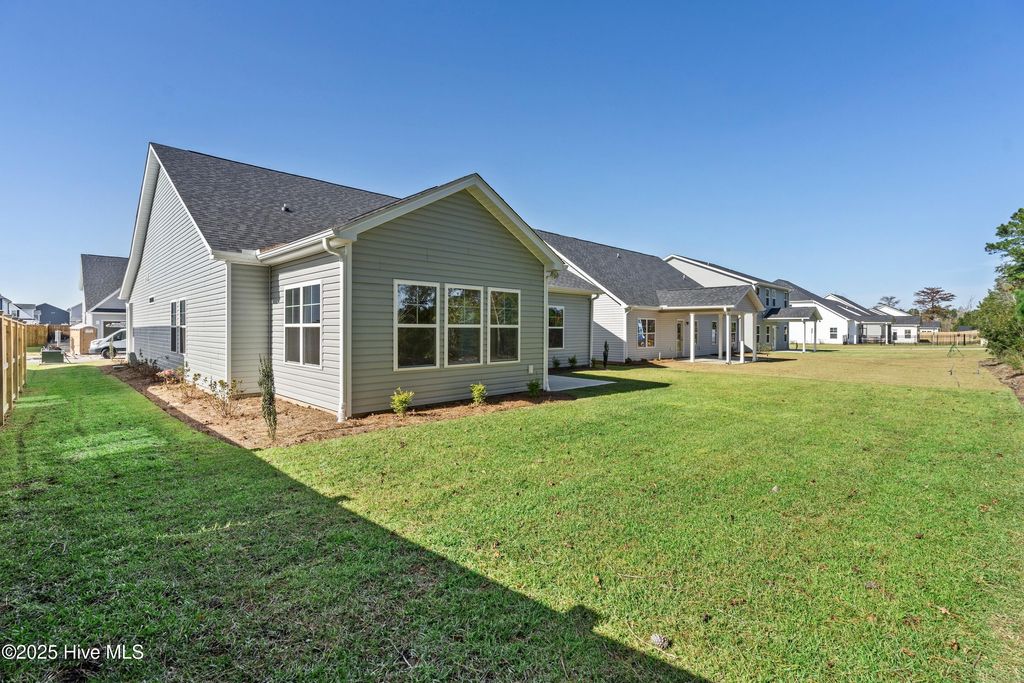 Photo of 822 Red Sky Drive NE, Winnabow, NC 28479 (MLS # 100543354)