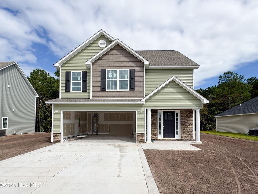 Photo of 712 Ellabond Street, Sneads Ferry, NC 28460 (MLS # 100499946)