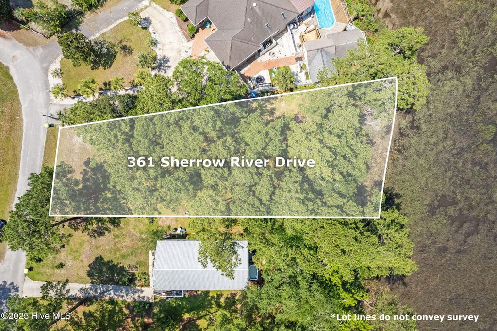 Photo of 361 Sherrow River Drive SW, Shallotte, NC 28470 (MLS # 100516619)