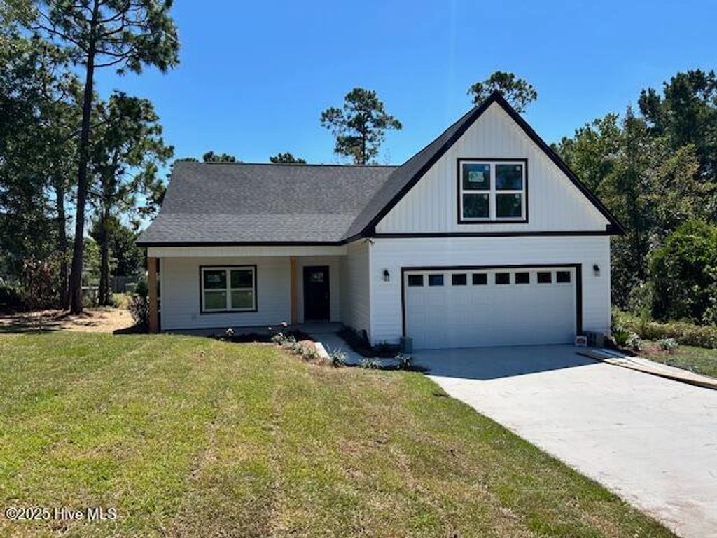 Photo of 1996 E Boiling Spring Road, Southport, NC 28461 (MLS # 100527597)