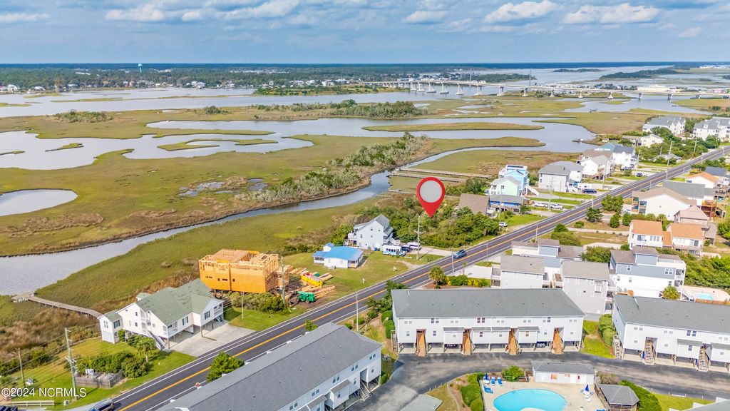 Photo of 817 S Topsail Drive, Surf City, NC 28445 (MLS # 100433786)