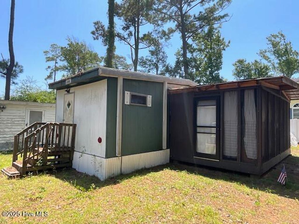 Photo of 254 NE 66th Street, Oak Island, NC 28465 (MLS # 100520962)