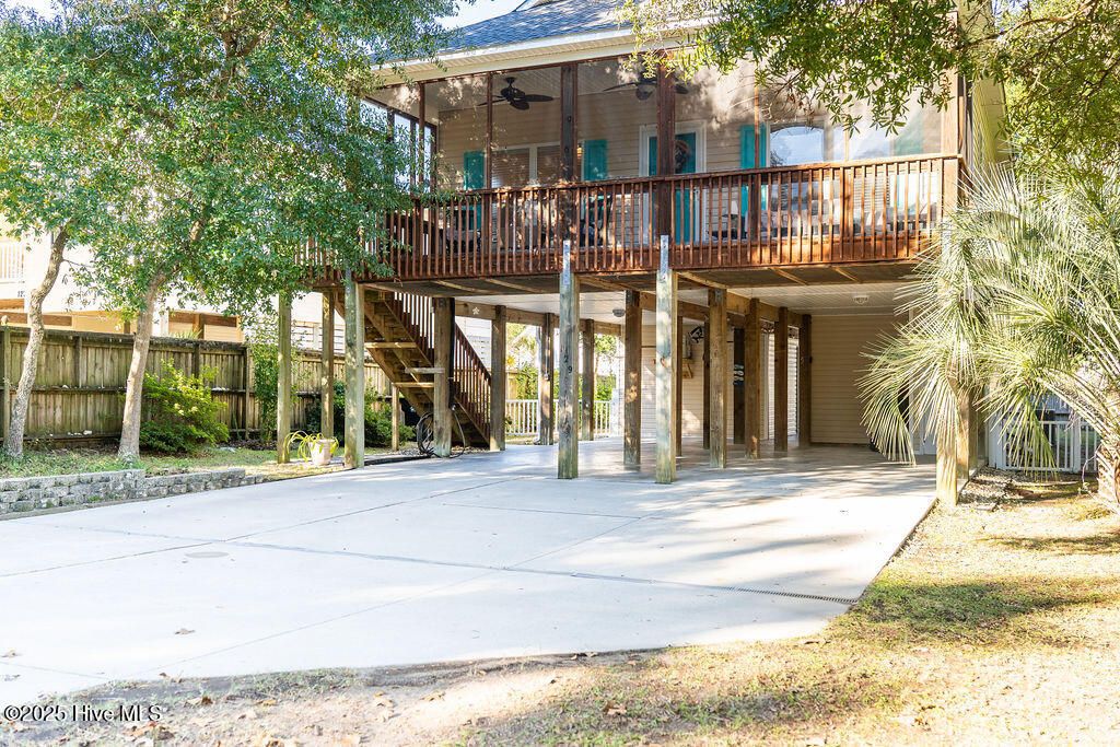 Photo of 129 NE 24th Street, Oak Island, NC 28465 (MLS # 100539197)