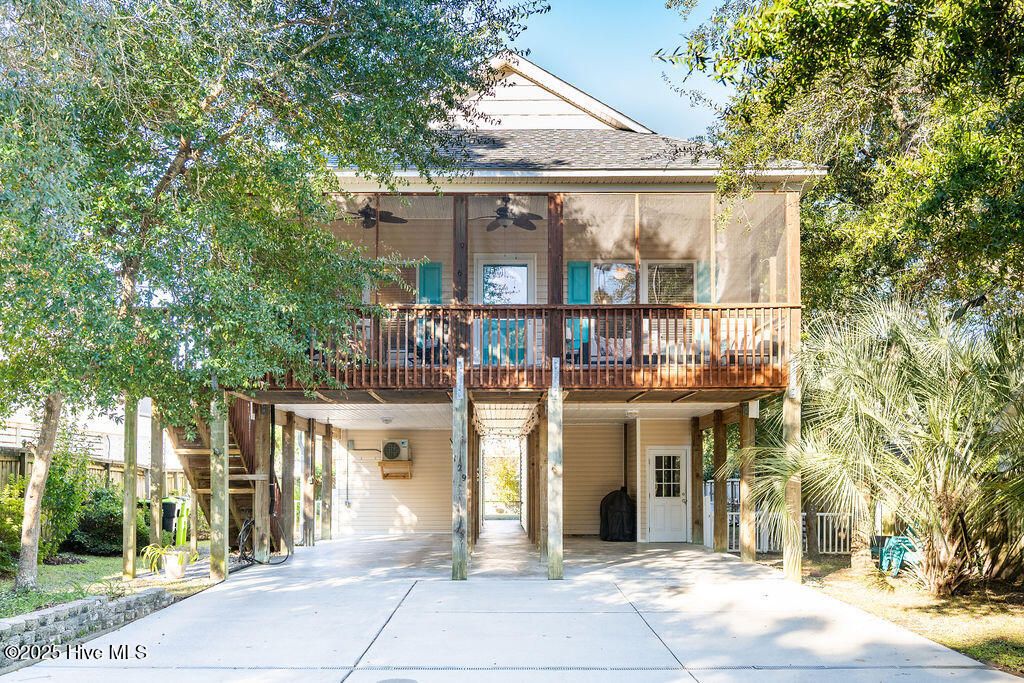 Photo of 129 NE 24th Street, Oak Island, NC 28465 (MLS # 100539197)