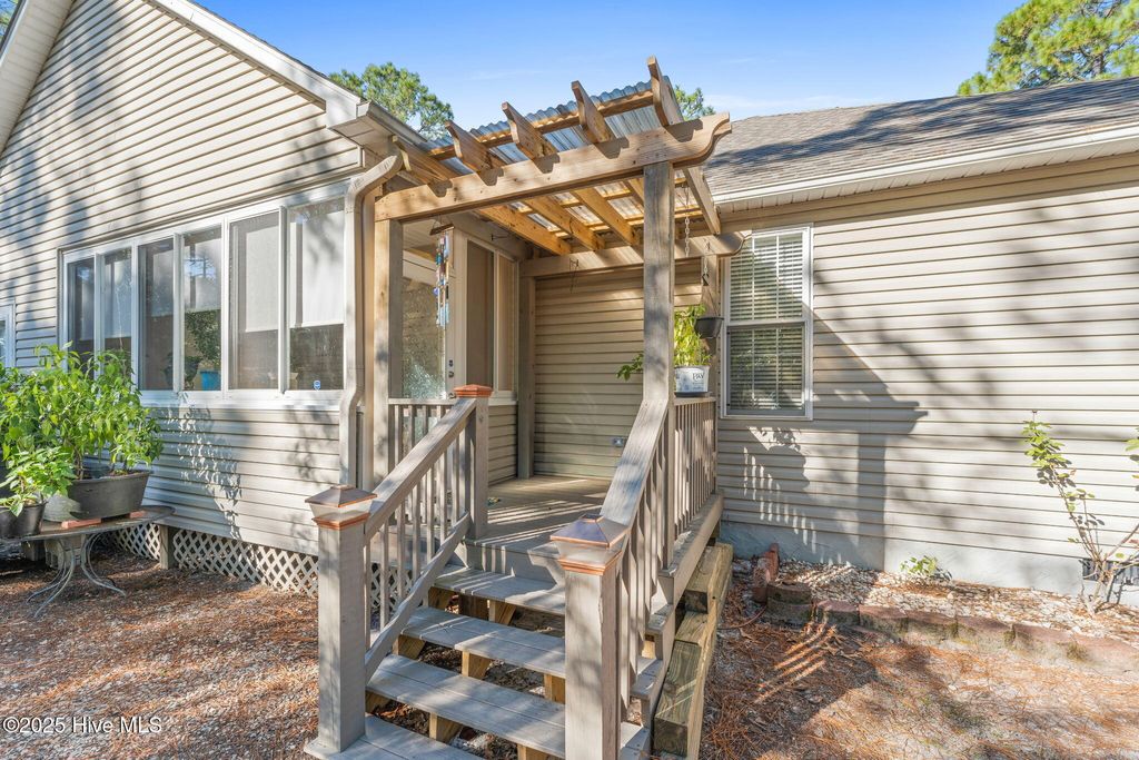 Photo of 3843 Winding Vine Way, Southport, NC 28461 (MLS # 100539831)