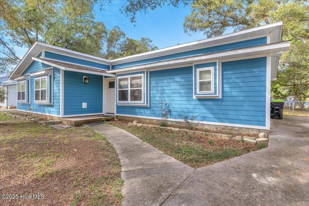Photo of 209 NE 56th Street, Oak Island, NC 28465 (MLS # 100535425)