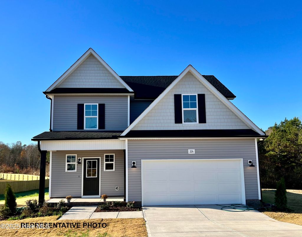 Photo of 685 Springtooth Drive, Zebulon, NC 27597 (MLS # 100530425)