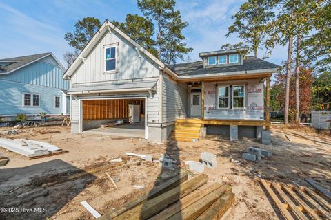 Photo of 418 Raven Glen Drive, Southport, NC 28461 (MLS # 100543070)
