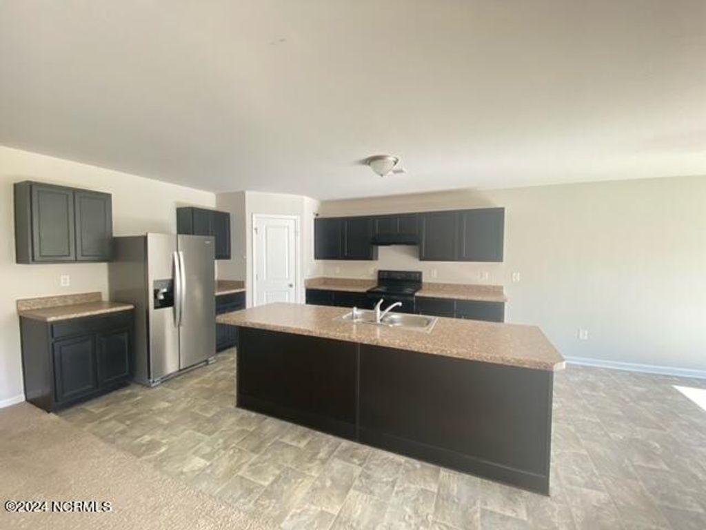 Photo of 736 Landmark Cove, Carolina Shores, NC 28467 (MLS # 100519231)