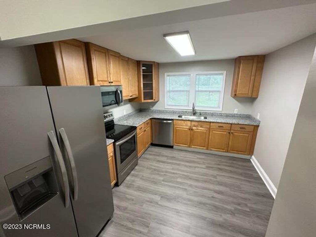 Photo of 8580 Ocean Highway W #1, Sunset Beach, NC 28468 (MLS # 100542106)