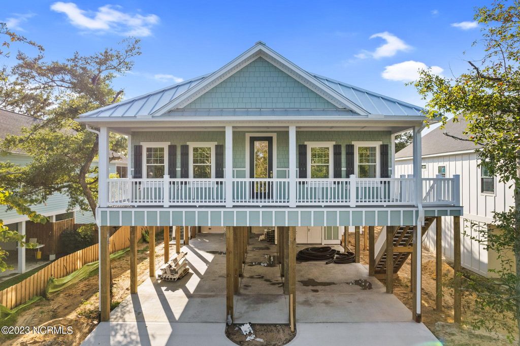 Photo of 230 NE 56th Street, Oak Island, NC 28465 (MLS # 100533439)