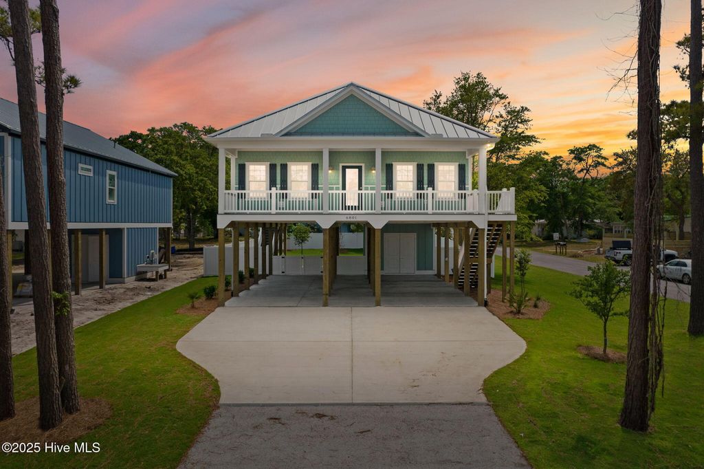Photo of 230 NE 56th Street, Oak Island, NC 28465 (MLS # 100533439)