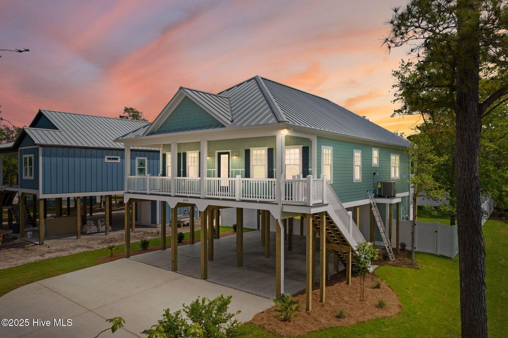 Photo of 230 NE 56th Street, Oak Island, NC 28465 (MLS # 100533439)