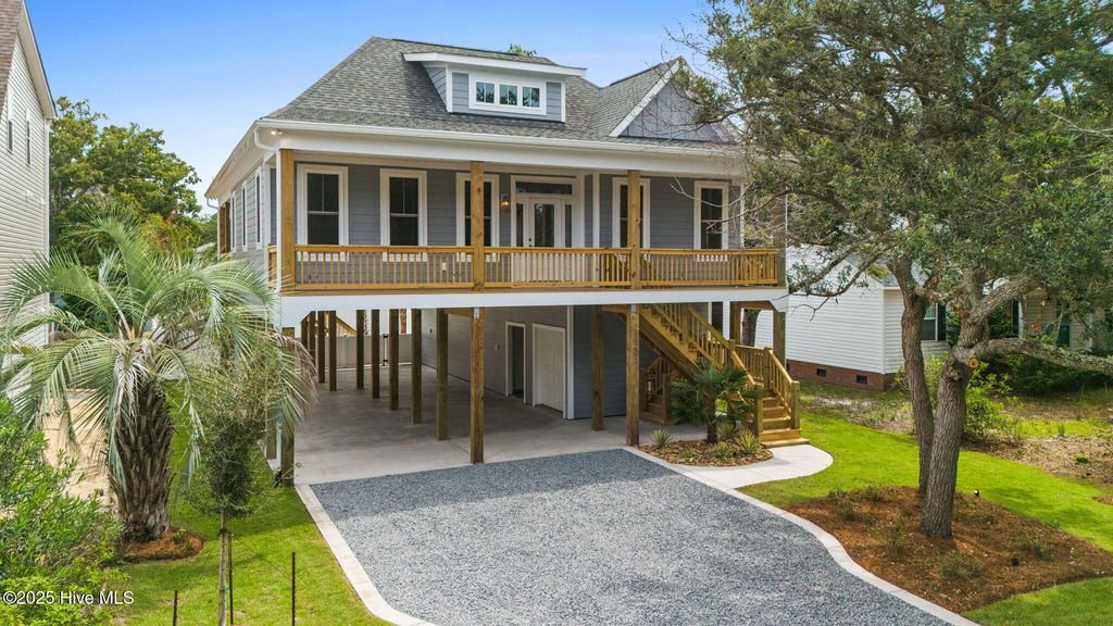 Photo of 210 NE 42nd Street, Oak Island, NC 28465 (MLS # 100517399)